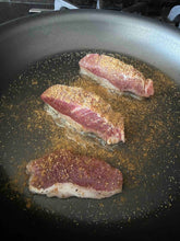 Three pieces of Bakar Meats seasoned lamb sirloin pan seared